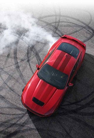 Overhead view of a 2024 Ford Mustang® model with tire tracks on pavement | Dotts Motor Co Inc in Clearfield PA